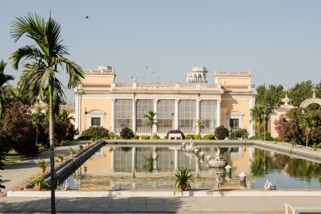 Chowmahalla Palace courtyard and fountain reflected in the water