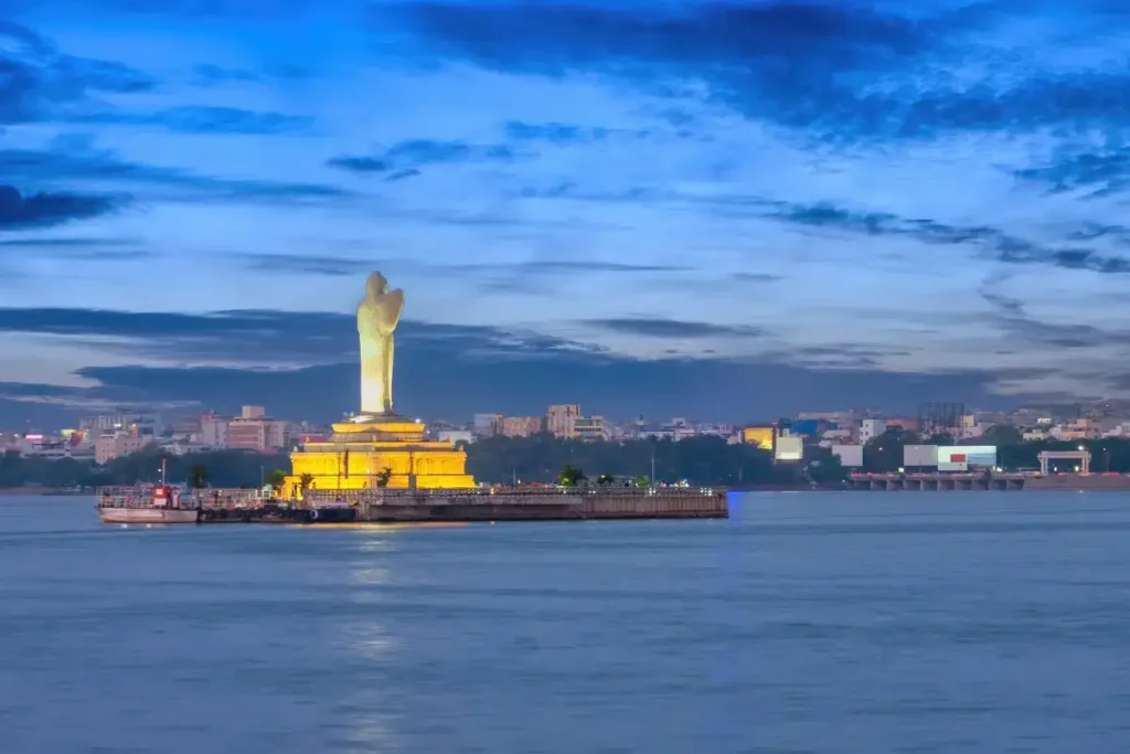 Iconic Buddha statue on heart-shaped Hussain Sagar Lake at dusk