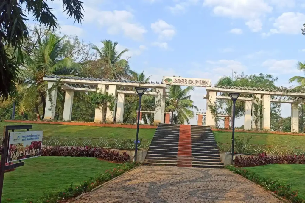 Pergola entrance and lush rose garden at Sanjeevaiah Park