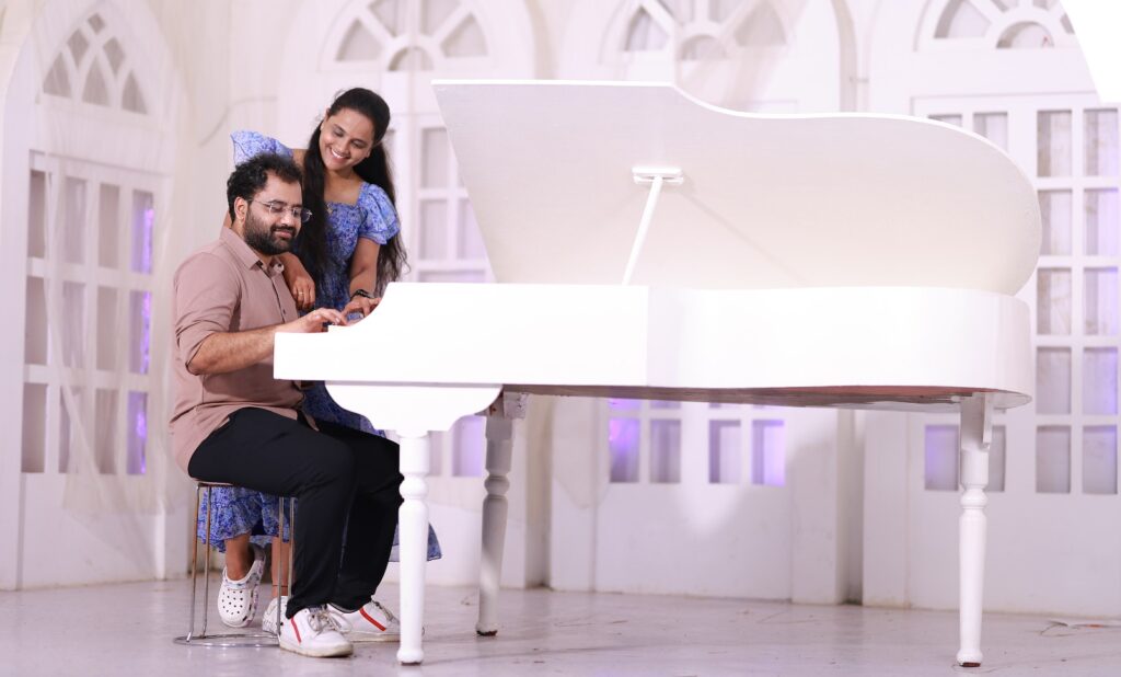 couple photoshoot in Hyderabad white grand piano studio