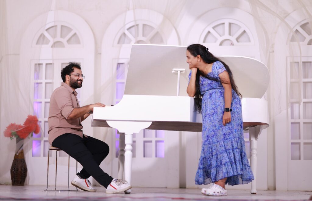 candid couple photoshoot Hyderabad piano backdrop