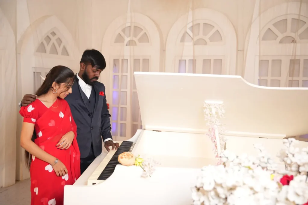 couple photoshoot in Hyderabad white piano studio set